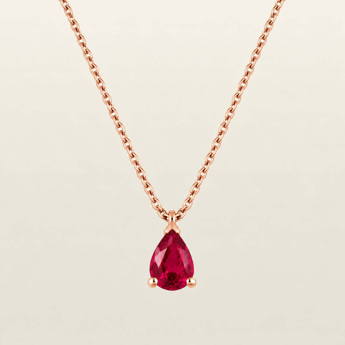 Pendentif Éternité en or rose, rubis taille poire serti de griffes